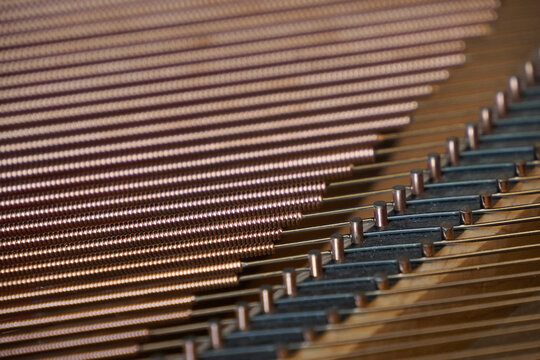 acoustic grand piano strings detail close up