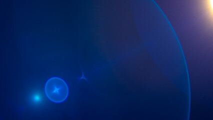A lens flare that forms a space-like background.