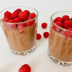 Chocolate Chia Pudding with Raspberries Served in Glass