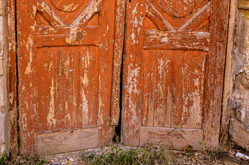 the old orange wooden doors