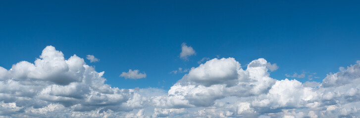 panorama of blue sky with white clouds. space to write a personalized message