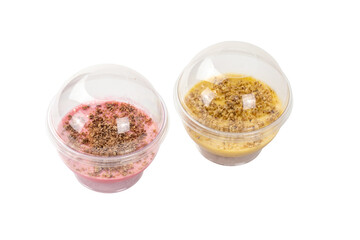 Two vibrant dessert cups show creamy textures topped with crunchy nuts, ideal for summertime treats or special occasions