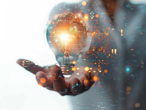 A creative light bulb held by a person, symbolizing innovation and ideas with a digital backdrop of glowing circuits.