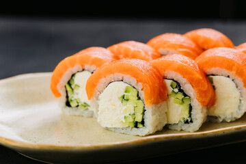 Philadelphia salmon sushi rolls with creamy filling, perfect for Japanese cuisine lovers 