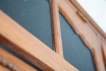 Close-Up of a Wooden Door with Dark Panel