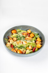 Caesar salad on white background