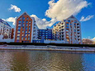 Gdansk, Poland  March 26, 2023: architecture of a modern city on the river bank. Gdansk, Poland