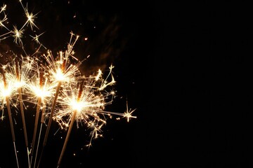 Bright Sparklers on a Dark Background