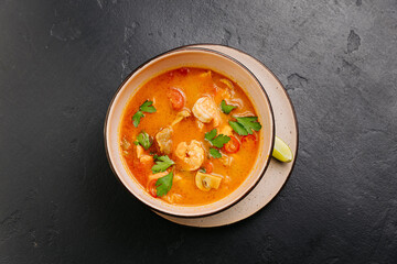 Spicy Thai Authentic Tom Yum soup with shrimp, mushrooms, and herbs, perfect for culinary projects