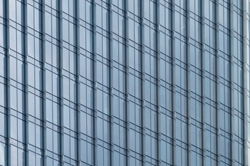 Multi-storey building in the city center. Business center, office. Modern architecture. Details of a modern building.