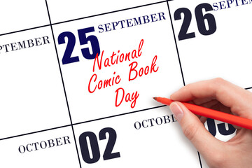 September 25. Hand writing text National Comic Book Day on calendar date. Save the date. Holiday. Important date. Day of the year concept.