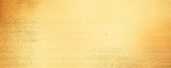 Obraz premium Golden yellow vintage paper background with a soft gradient of light and dark tones, creating an antique look that adds depth to your design projects.