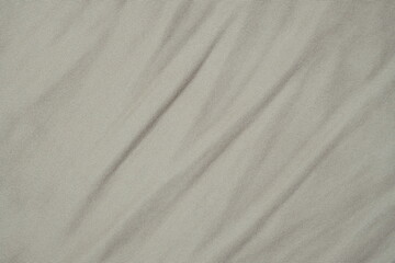 Obraz premium wrinkled light brown fabric texture clothes