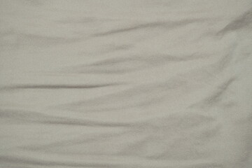 Naklejka premium wrinkled light brown fabric texture clothes