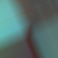 An abstract pattern of greenish gradient lines.