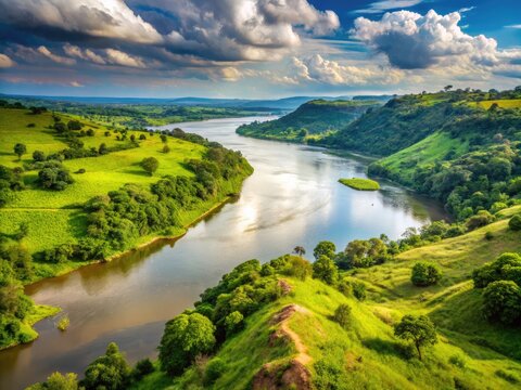 A Panoramic View Of The Nile River Flowing Through The Lush Green Landscape Of Uganda