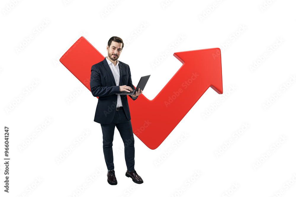 Poster Businessman in a suit using a laptop, standing in front of a large red arrow pointing upwards, on a white background. Concept of growth and success