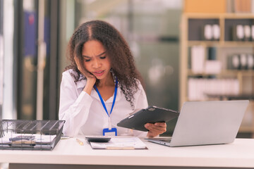 Financial advisor, businesswoman doing finance, mathematics on wooden table in office and business background, tax, accounting, statistics and analytical research concept.