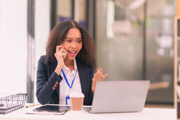Fototapeta premium Financial advisor, businesswoman doing finance, mathematics on wooden table in office and business background, tax, accounting, statistics and analytical research concept.