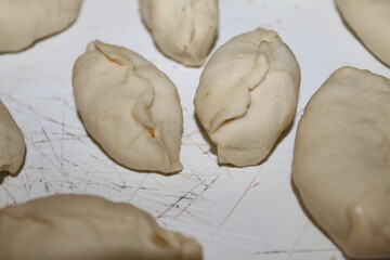 dumplings on a wooden board