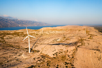 Wind turbines produce sustainable electric power on Pag Island. Innovative solution to obtain...