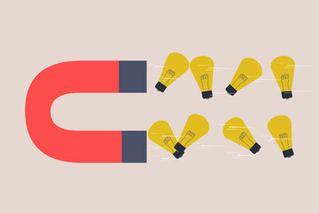 Magnet magnetize lightbulb ideas. concept of new ideas, opportunity and success