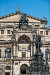 King Johann of Saxony monument and Semperoper opera house on the Theaterplatz square in the historic centre of Dresden, Germany