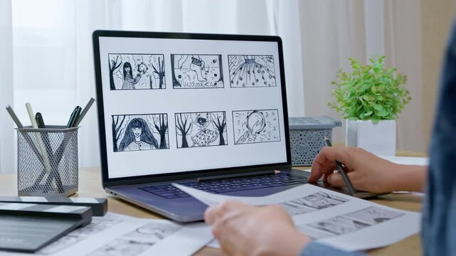 Storyboard of scenes on a laptop screen. Shots with characters drawn by an artist for a cartoon or comics. A director preparing to shoot a film.