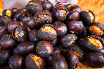 Japanese chestnuts are roasted until ripe and ready for sale.