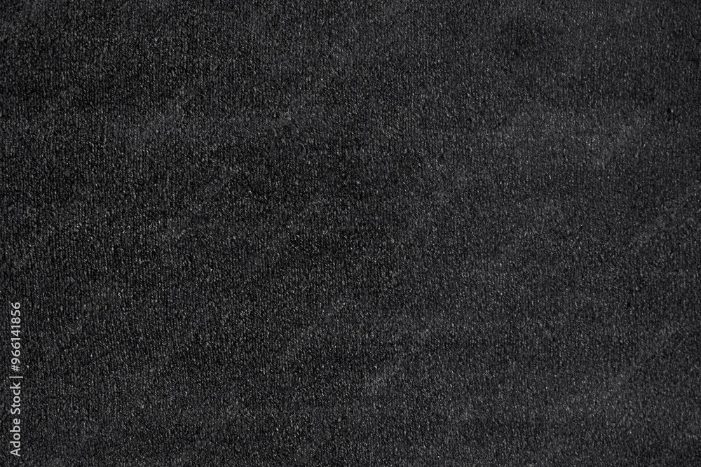 Poster textured black cotton canvas surface, featuring a subtle sheen and fine grain. the surface appears s