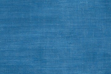 Textured blue cotton chambray fabric, showcasing a subtle weave pattern. The fabric has a soft, smooth appearance, ideal for various textile applications.