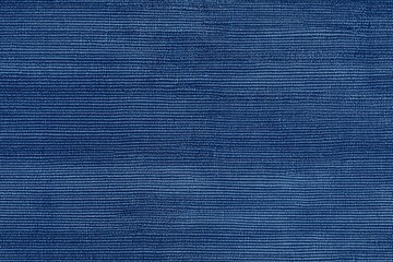Textured blue cotton chambray fabric, showcasing a woven pattern. The fabric appears soft and durable, suitable for various textile applications.