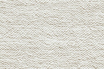 Textured white fabric cotton chenille surface, showcasing a soft and woven appearance. The fabric has a subtle pattern, ideal for backgrounds or textile design.