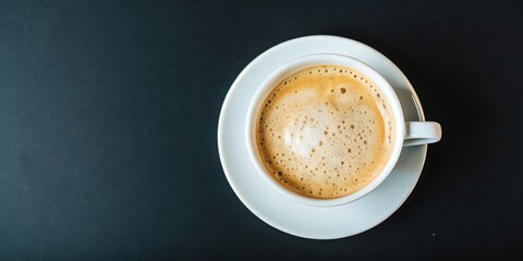 Cup of Coffee on Black Background. Top View Copy Space