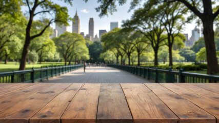 Urban Tranquility: An Empty Wooden Tabletop Overlooking a Softly Blurred View of Central Park's Lush Greenery