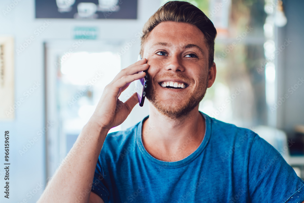 Aufkleber cheerful hipster guy with takeaway cup smiling while talking with best friend using 4g wireless inte
