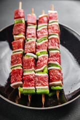 raw kebab meat and vegetables pork, lard, pepper, vegetable dish fresh delicious gourmet food background on the table rustic food top view copy space