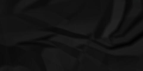 Crumpled texture of dark black wrinkle chaotic paper. old crumple black paper sheet abstract shape background space for text.	
