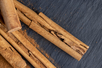cinnamon tree bark with golden powder