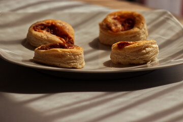 Small Italian pizzas on a white plate.