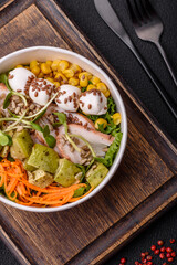 Delicious diet salad with turkey or chicken slices, lettuce, carrots, mozzarella