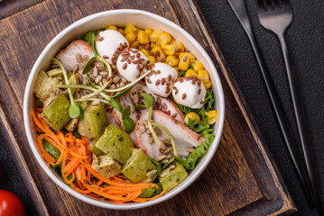 Delicious diet salad with turkey or chicken slices, lettuce, carrots, mozzarella