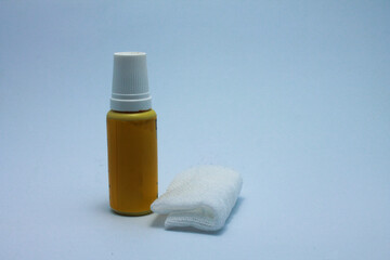 isolated gauze and bottle of wound medicine
