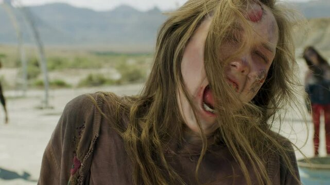 Close up on zombie woman making scary face expressions 