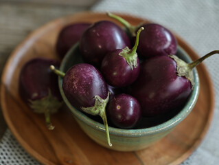 bowl of baby eggplants