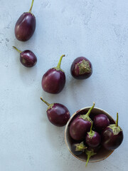 assorted baby eggplants on countertop