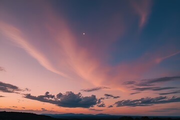 Obraz premium Breathtaking Sunset Sky with Pastel Clouds and Enchanting Glow