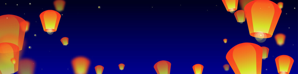 Sky lanterns floating in the night sky.