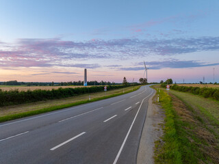 Aerial view of Tallinn-Narva highway on a sunny summer evening. Ida Viru county (Estonian - Ida Virumaa), Estonia. 
