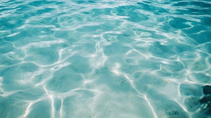 Obraz premium A close-up of crystal clear sea water, highlighting the textures and colors against a minimalistic light solid color background,No blurriness